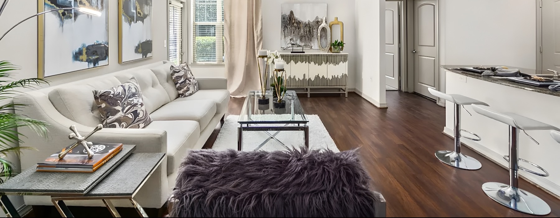 a living room with a couch and a table