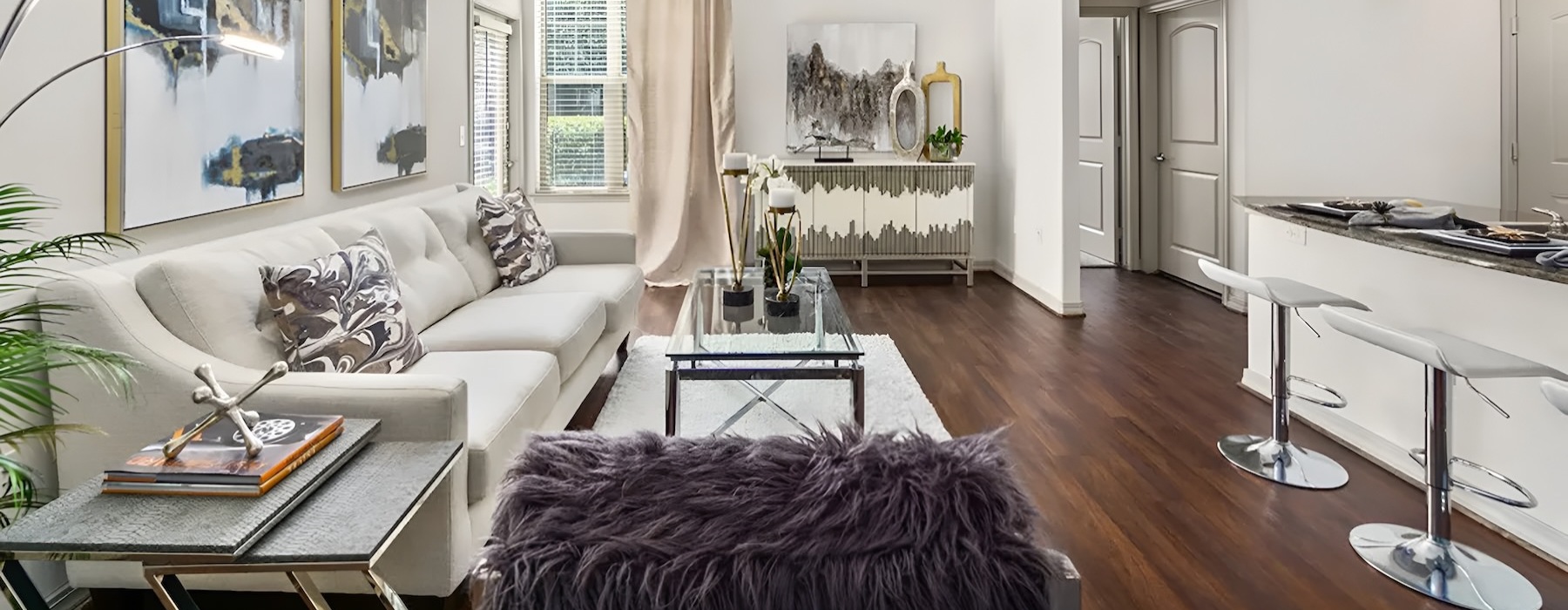 a living room with a couch and a table