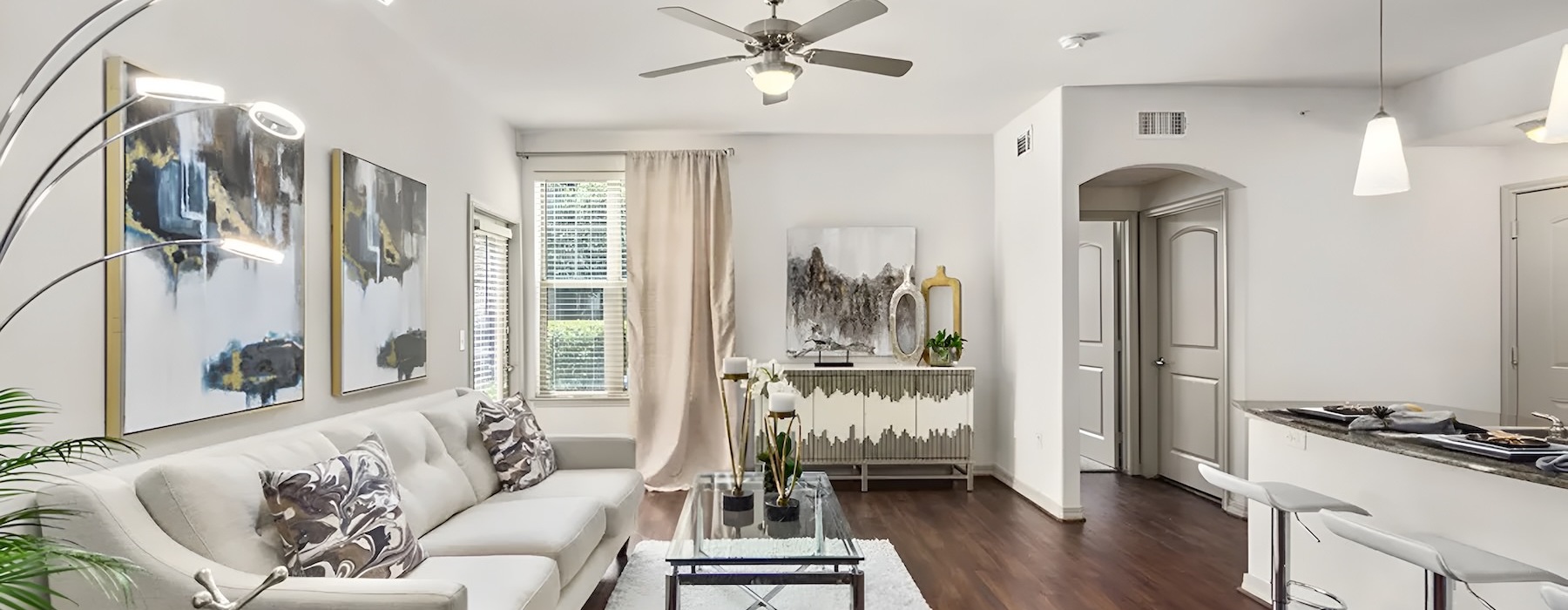 a living room with a couch and a table